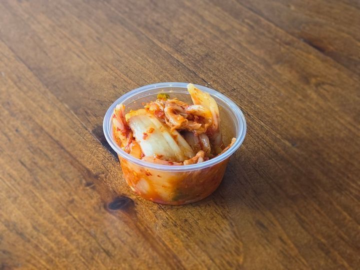 A side of spicy, fermented napa cabbage kimchi.