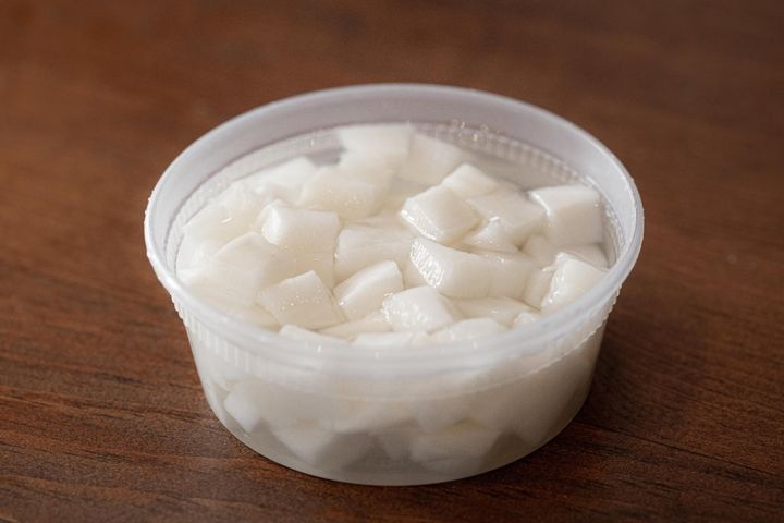 A side of tangy pickled daikon radish.