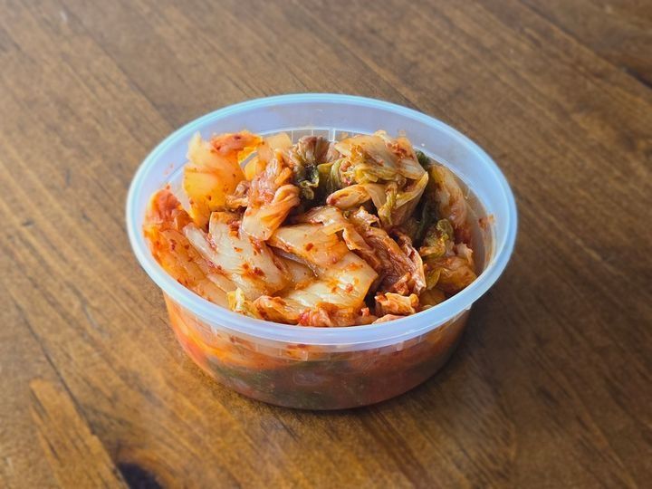 A side of spicy, fermented napa cabbage kimchi.