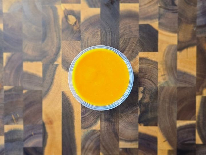 A serving of tangy honey glaze sauce.