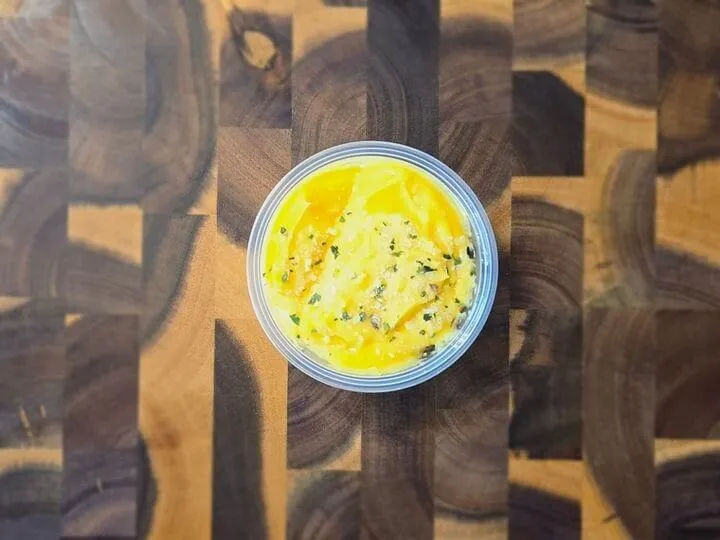 A serving of spicy nacho cheese sauce.