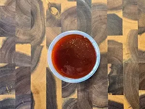 A serving of mild Korean sweet and spicy gochujang sauce.