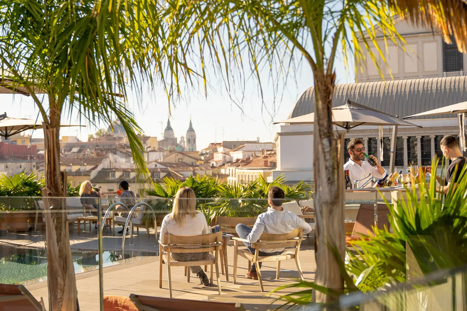 The Sky Bar rooftop terrace and pool at Ocean Drive Madrid, over the old-Madrid skyline