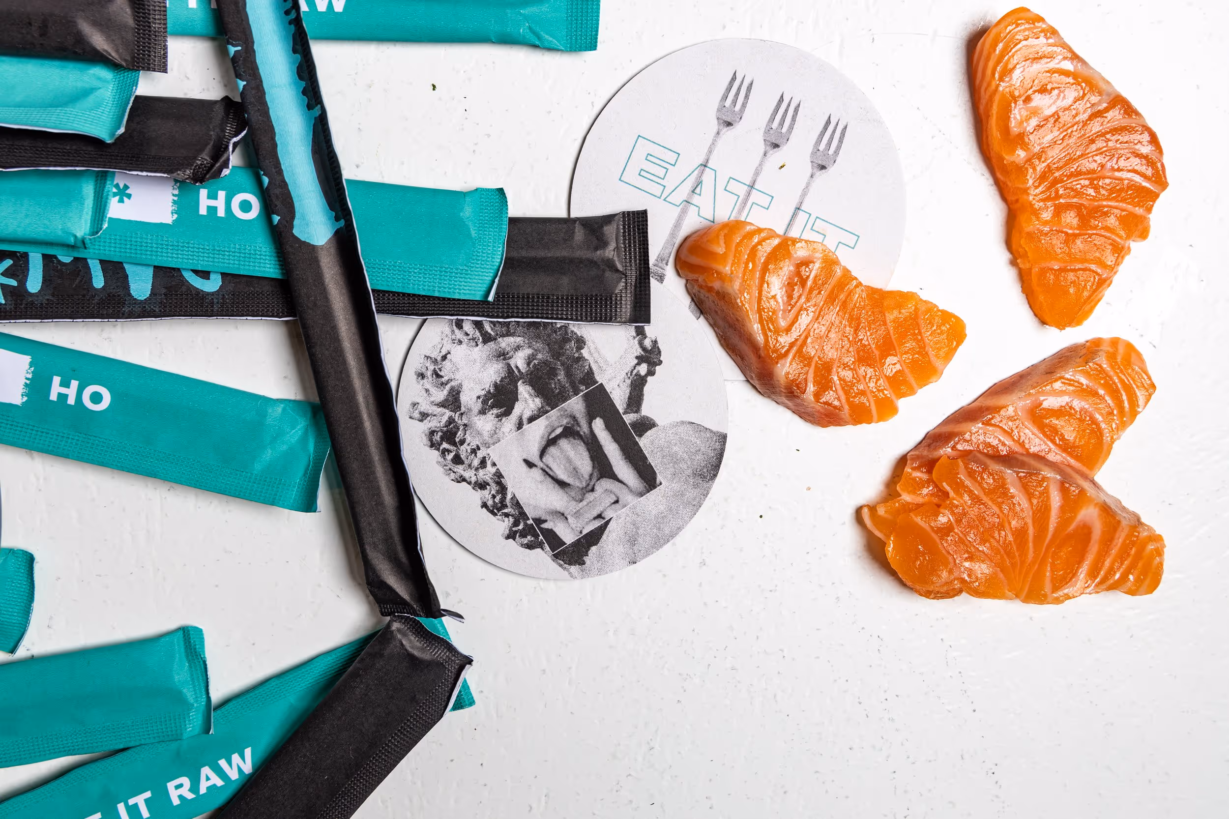 RAW brand visual identity, featuring food photography, packaging, and graphic elements.