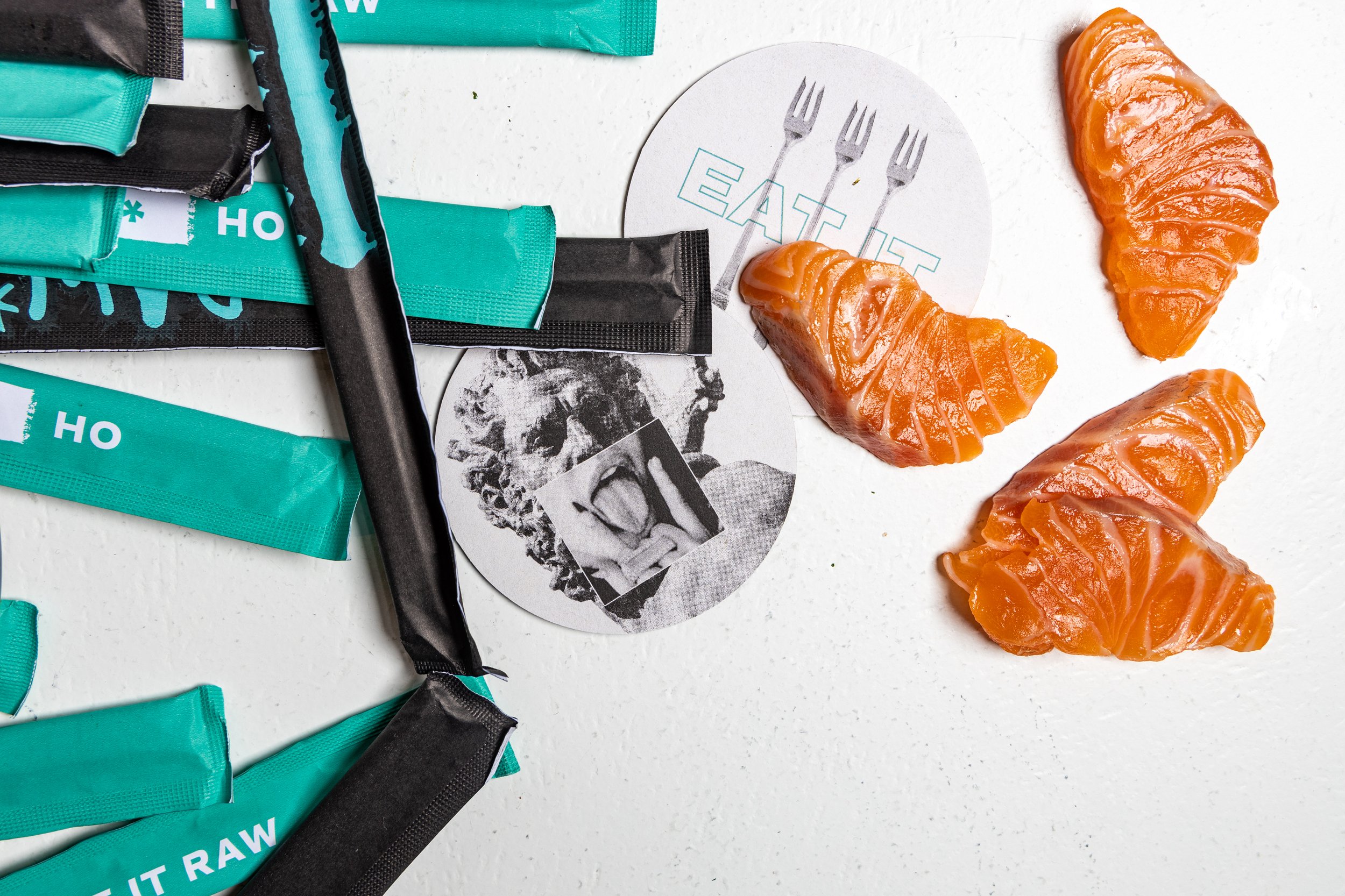 RAW brand visual identity, featuring food photography, packaging, and graphic elements.