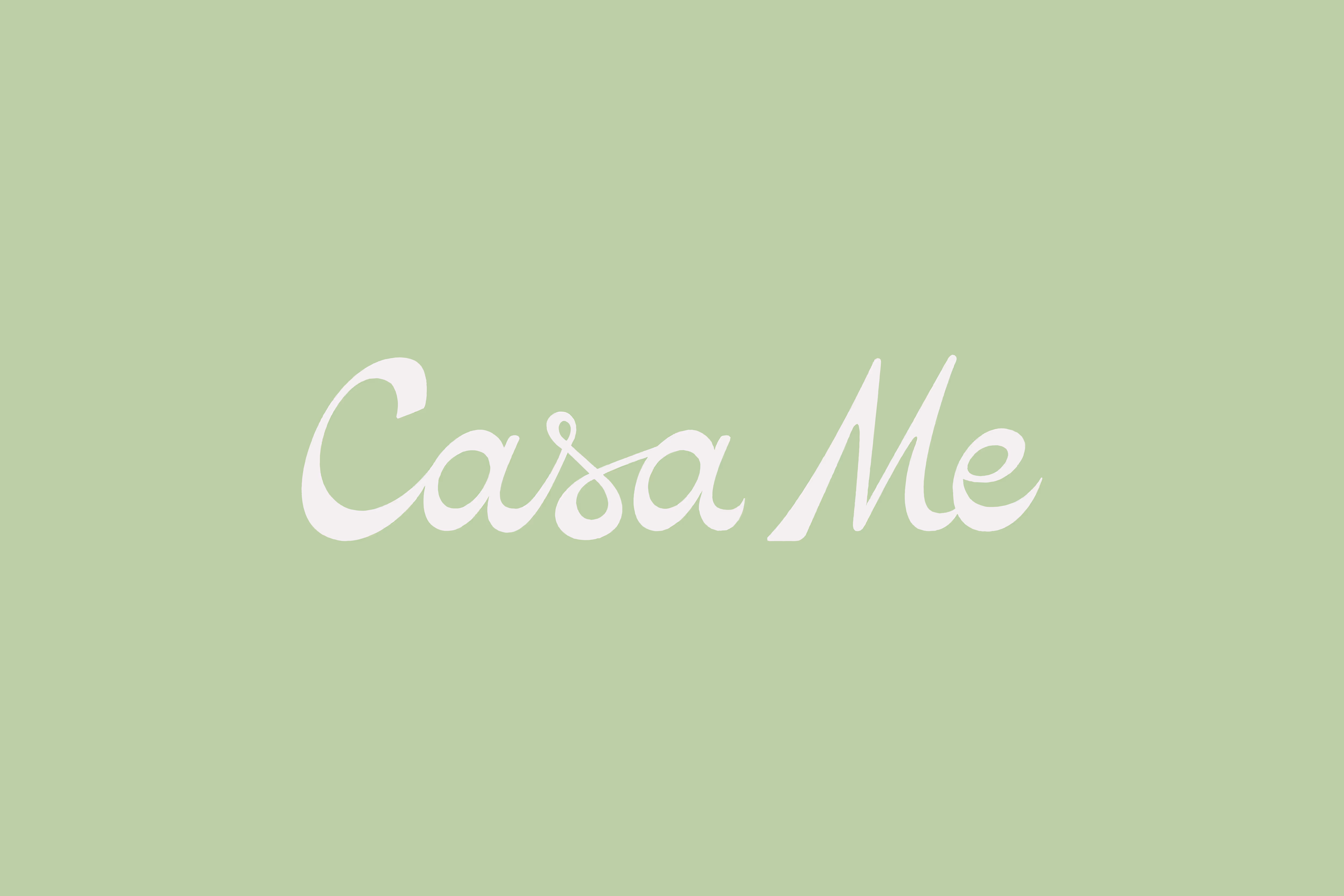Image of the "Casa Me" logo, highlighting the flowing script and soft color palette, conveying a sense of warmth and invitation.