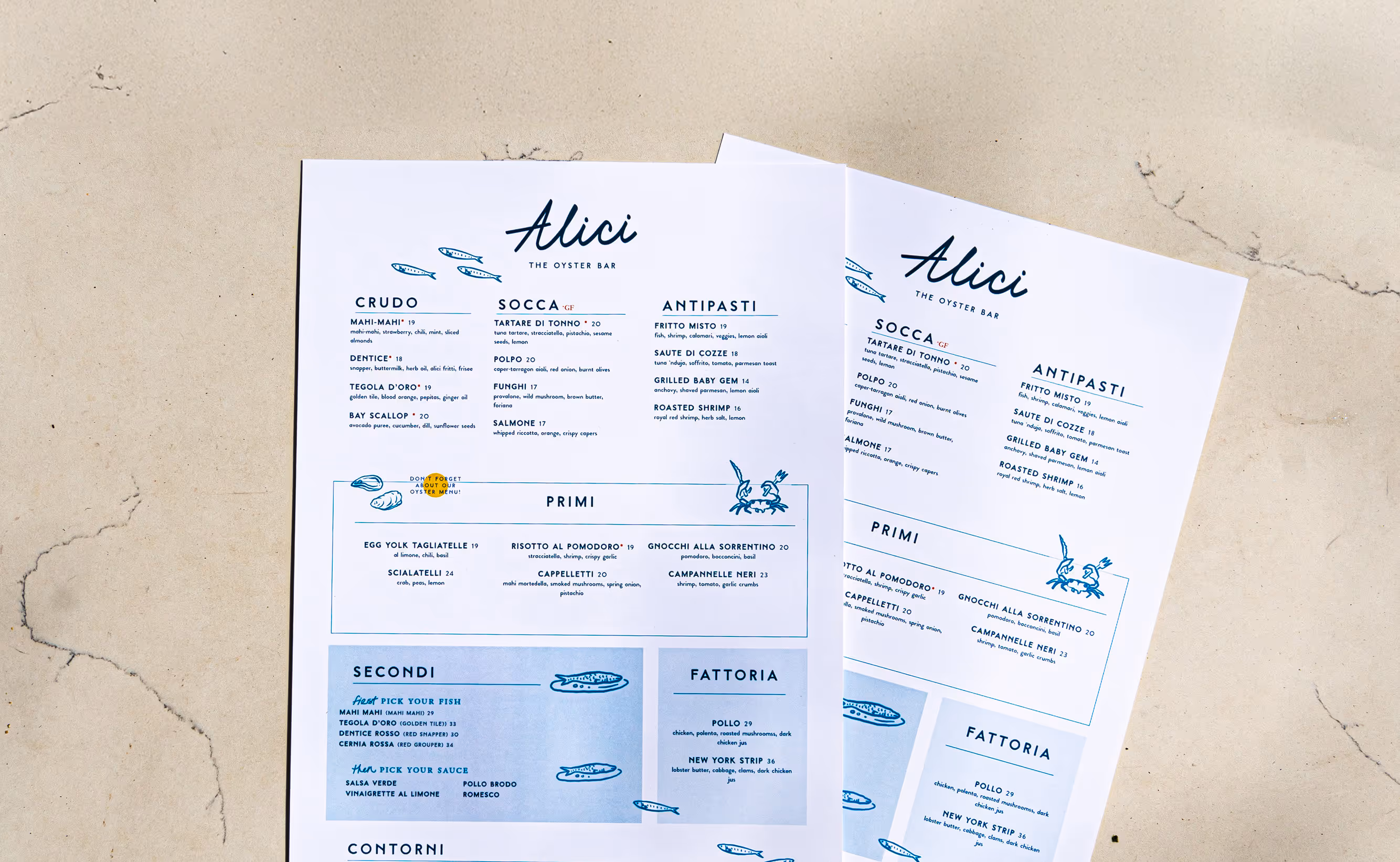 Image of two Alici menus showcasing a clean layout, custom typography, playful fish illustrations, and a light color palette, highlighting the restaurant's offerings and brand aesthetic.