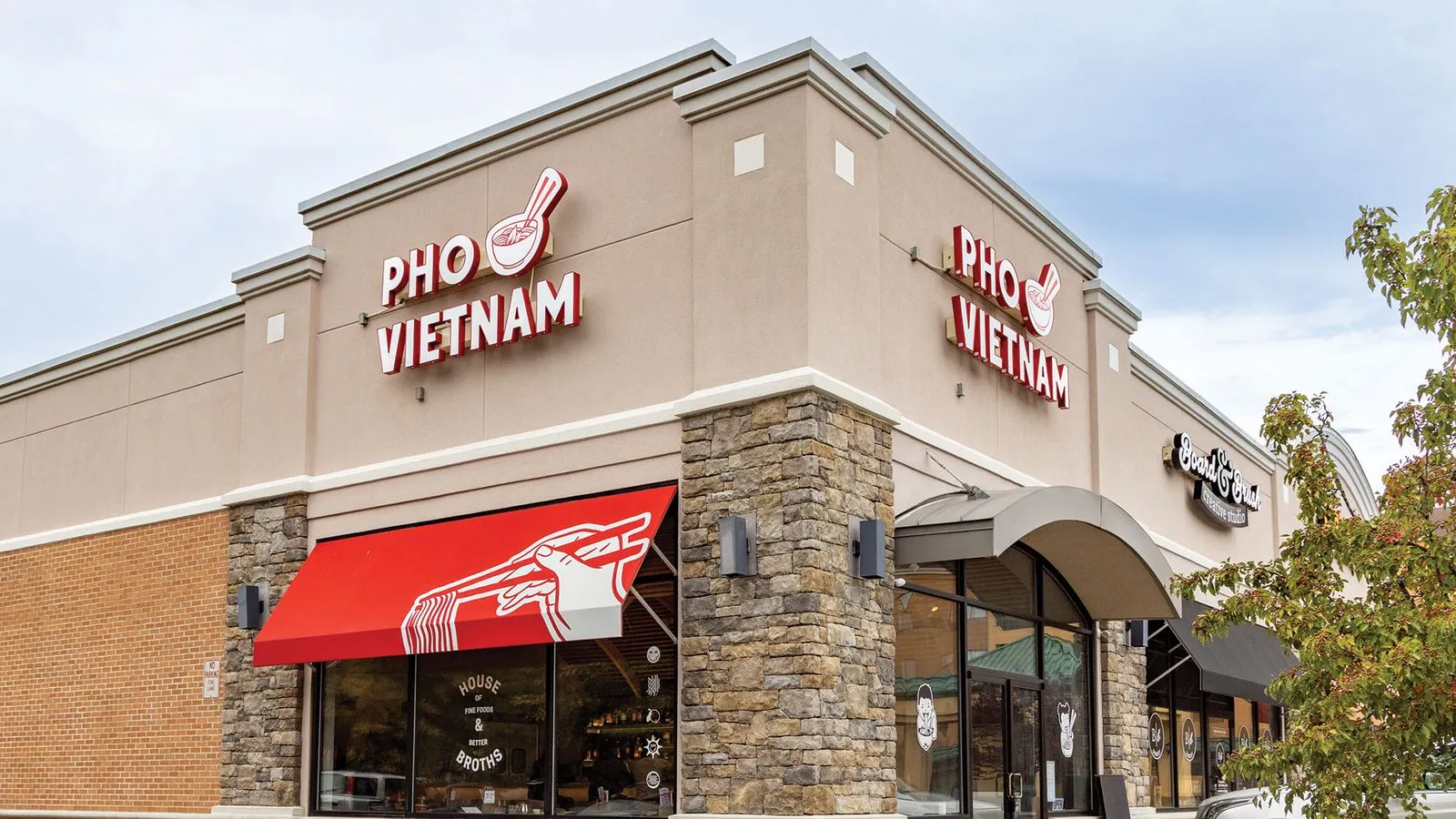 Pho Vietnam restaurant exterior with signage and awning.