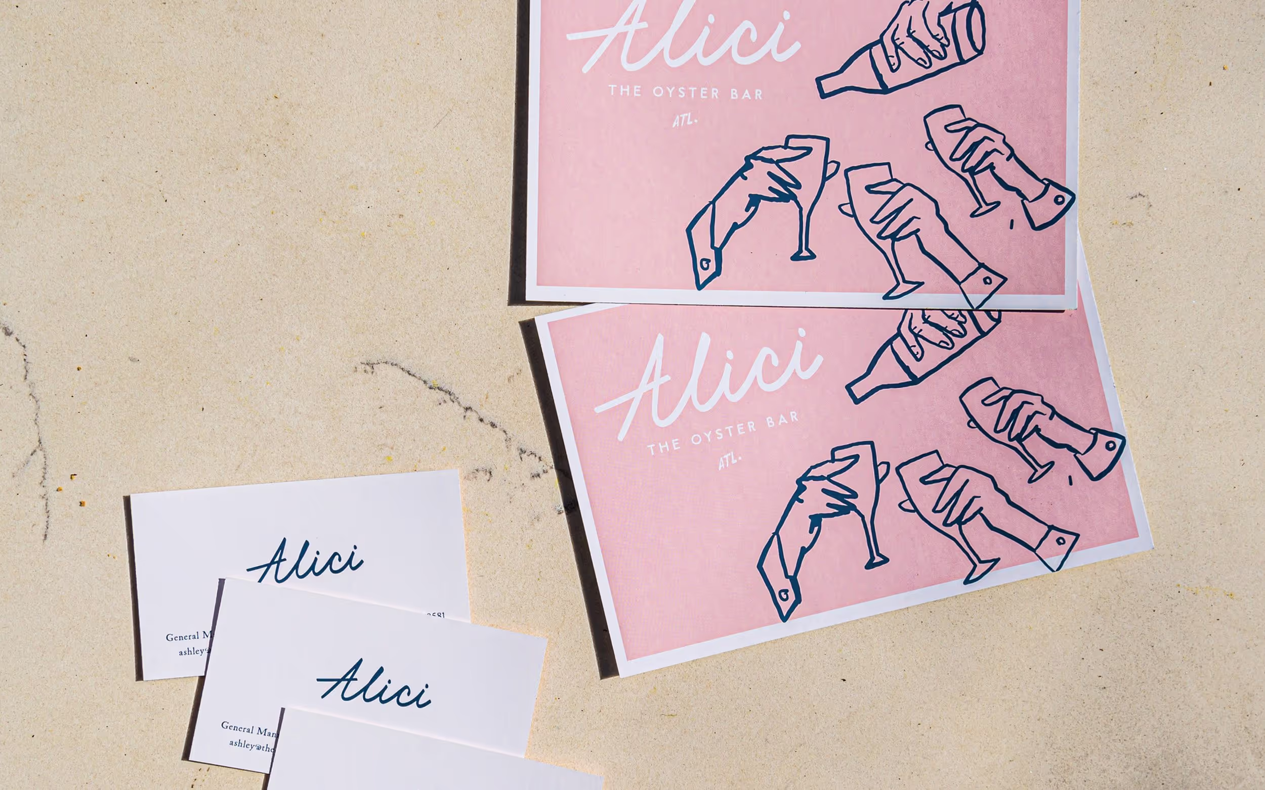 Image of Alici marketing collateral, including menus and business cards, showcasing the brand's logo, playful illustrations, and a consistent visual identity across different formats.