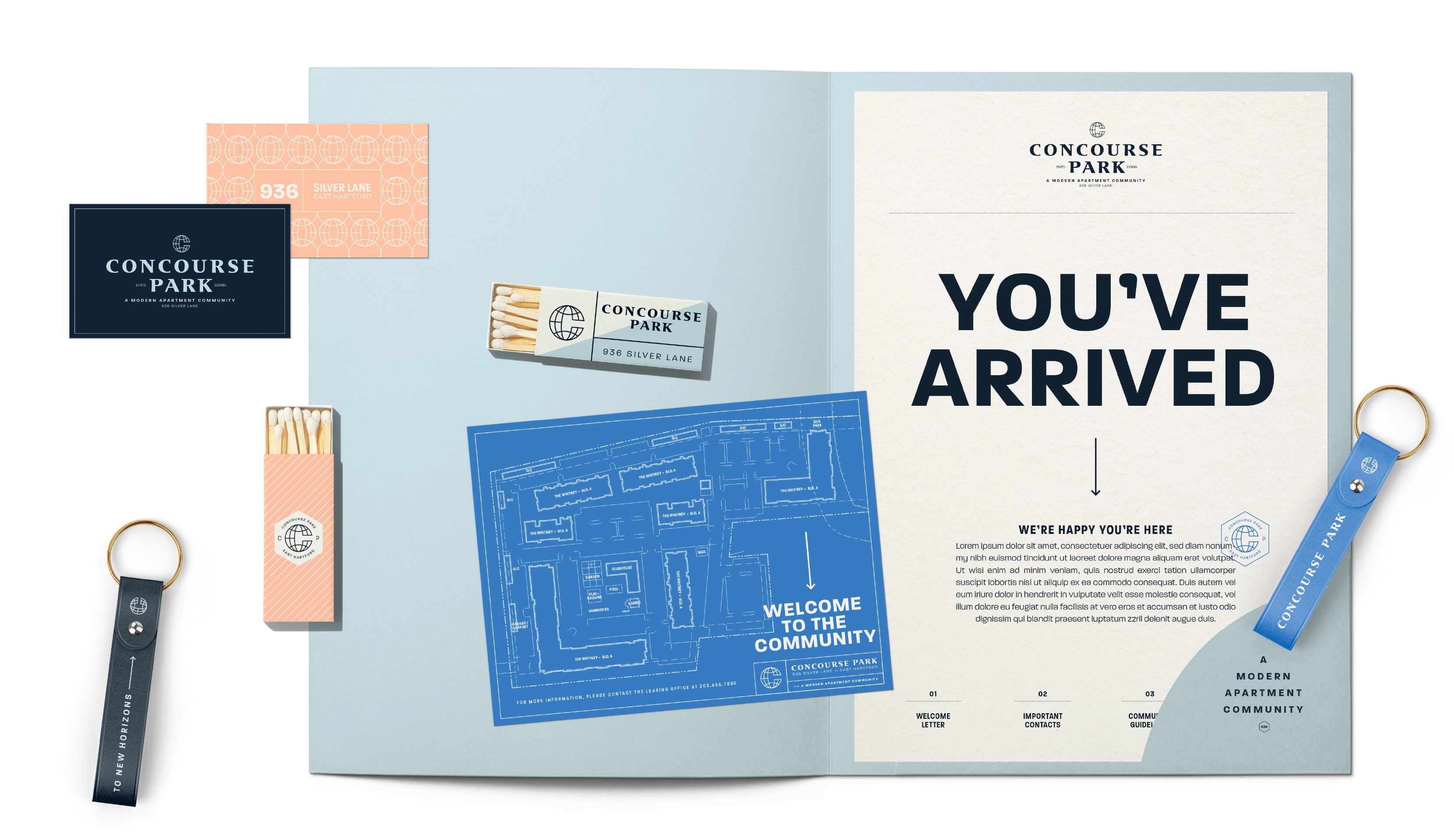 Flat lay of Concourse Park marketing materials, including brochures, matchbooks, keychains, and a site plan, showcasing the brand's visual identity and promotional items.