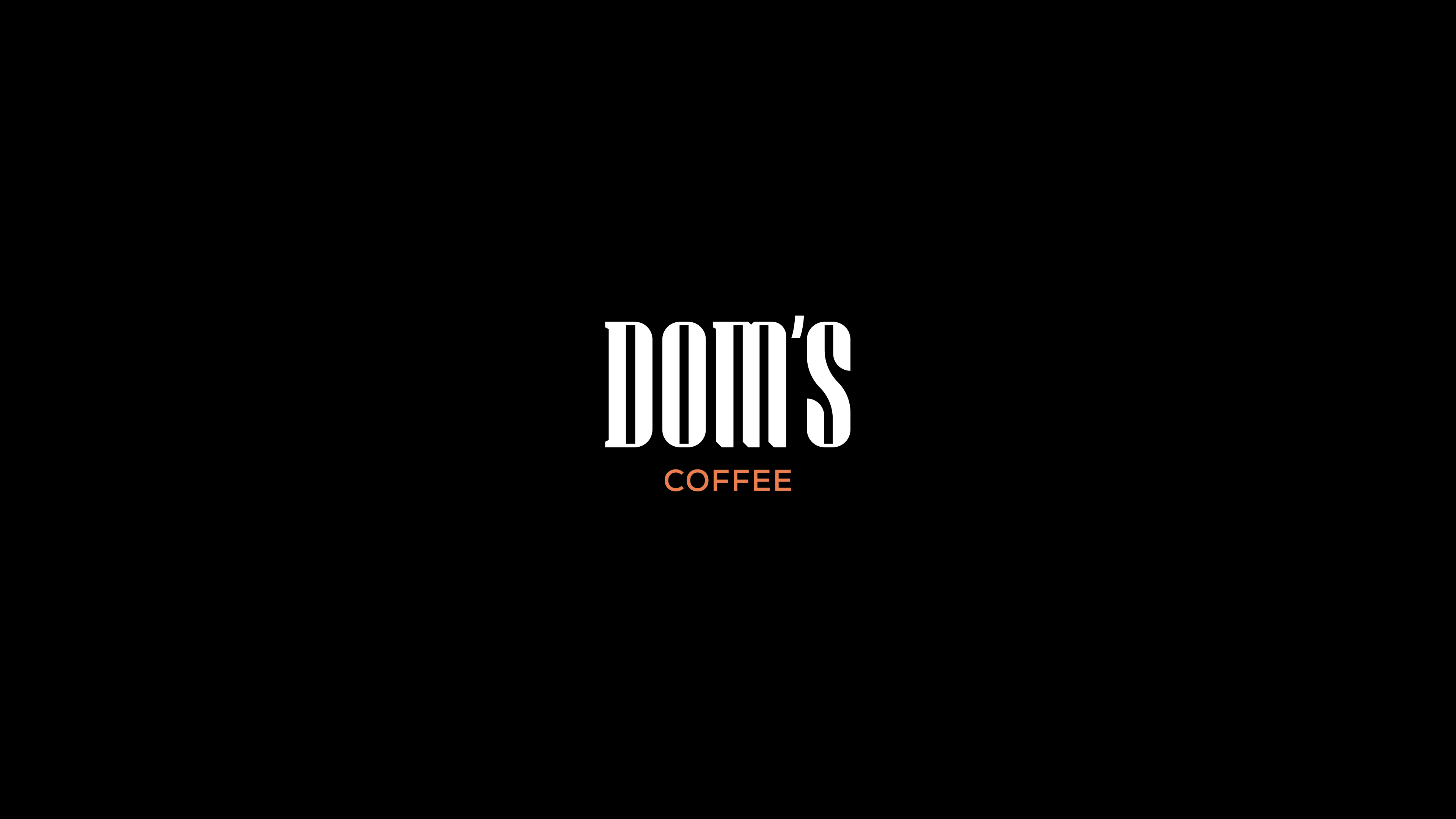 Animation showcasing the Dom's logo. The animation alternates between "COFFEE" in orange and "CREAMERY" in teal.