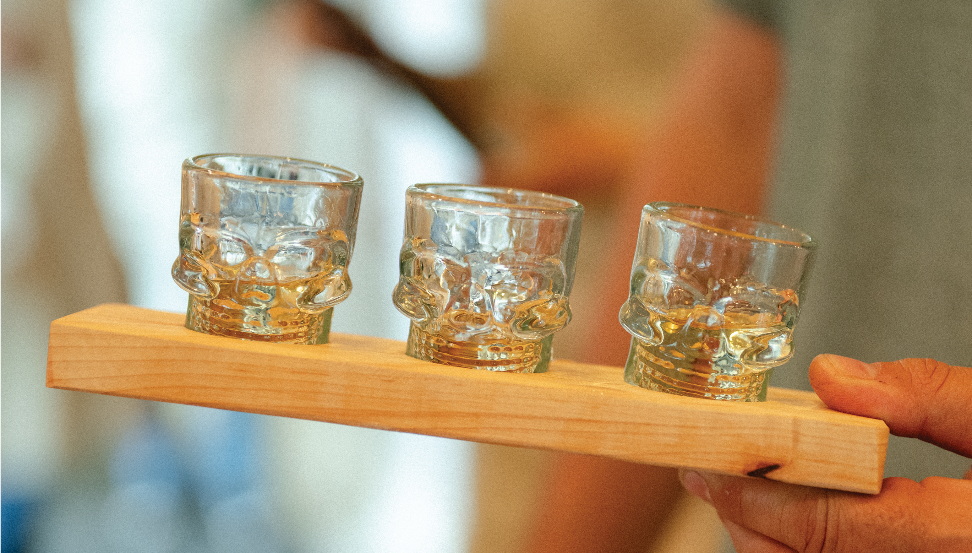 Image of skull shot glasses inside a Mexican restaurant.
