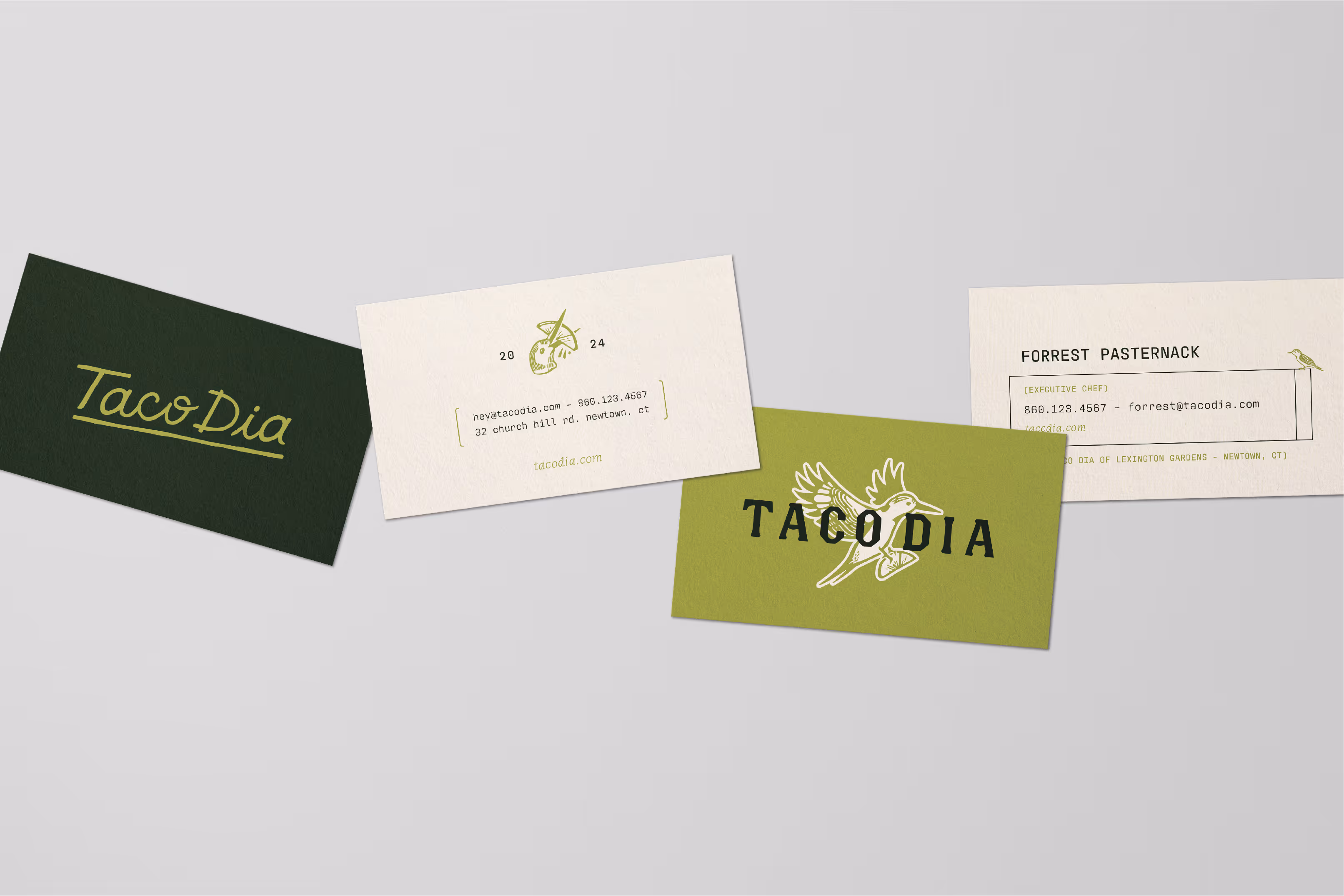 An image of various custom designed business cards featuring Taco Dia branding in Newtown, CT.