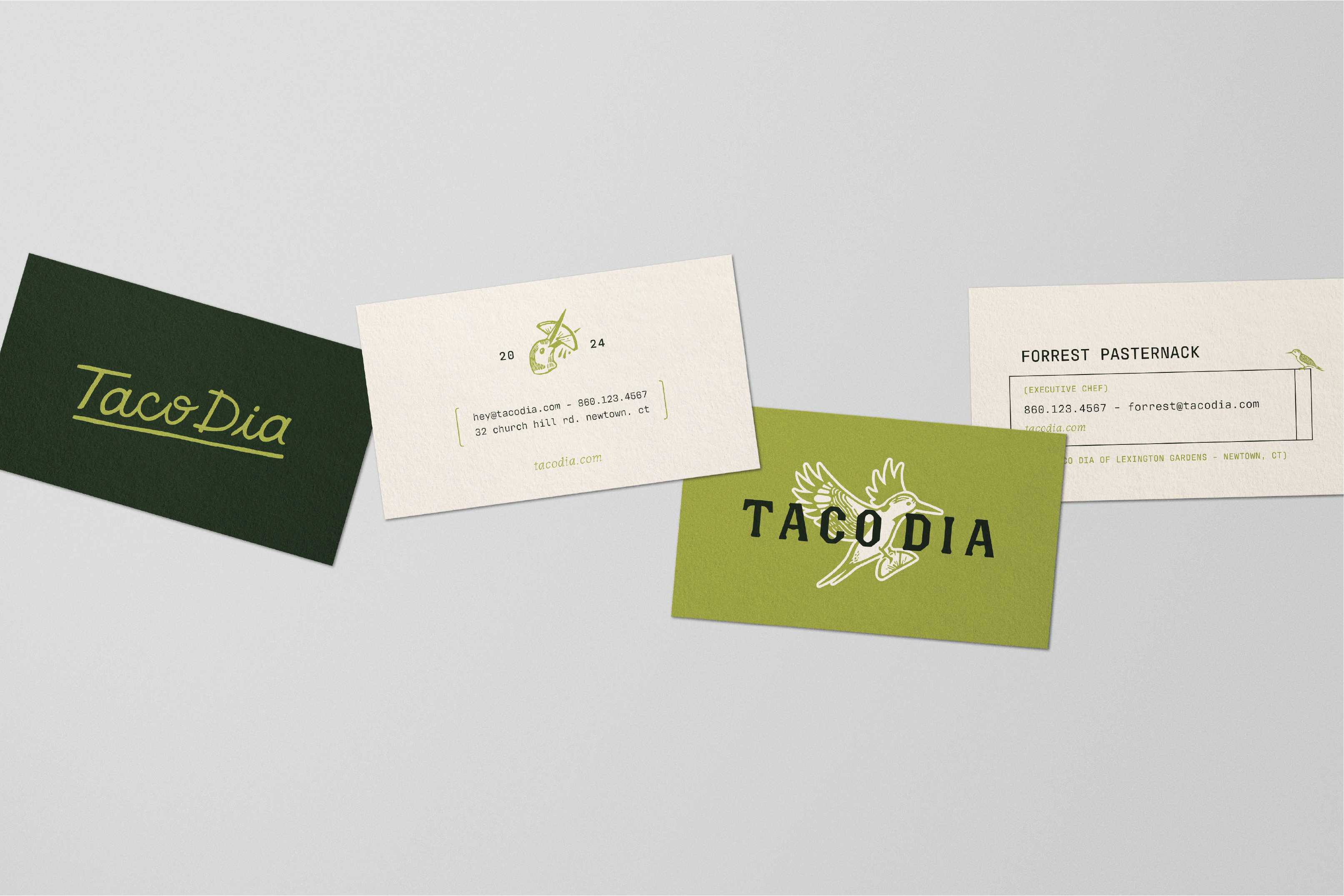 An image of various custom designed business cards featuring Taco Dia branding in Newtown, CT.