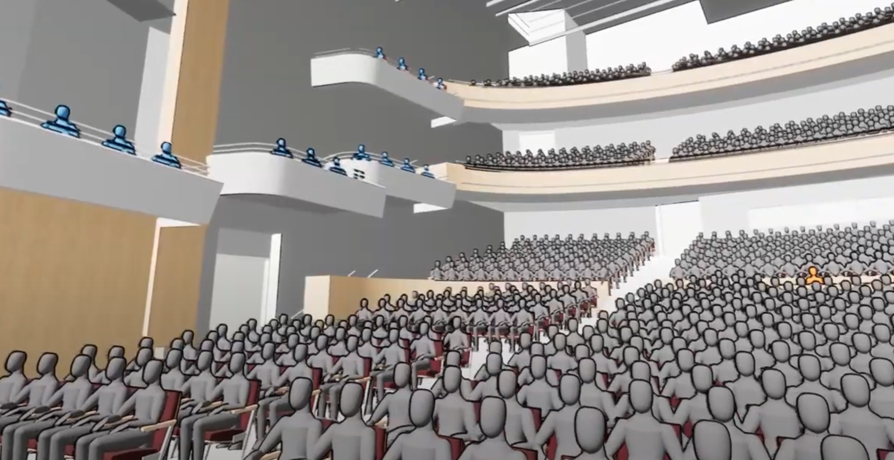 A screenshot from Agile Lens' Blueprint Immersive software showing a large, multi-balcony, virtual theater, populated with digital mannequins.  
