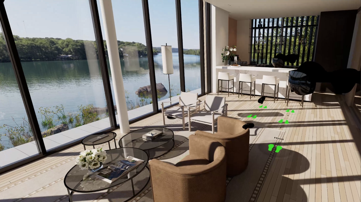 A boathouse lounge which includes chairs, tables looking out over Lake Austin through large glass windows.