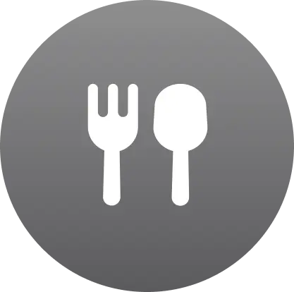 Grayscale icon of a fork and spoon on a circular background