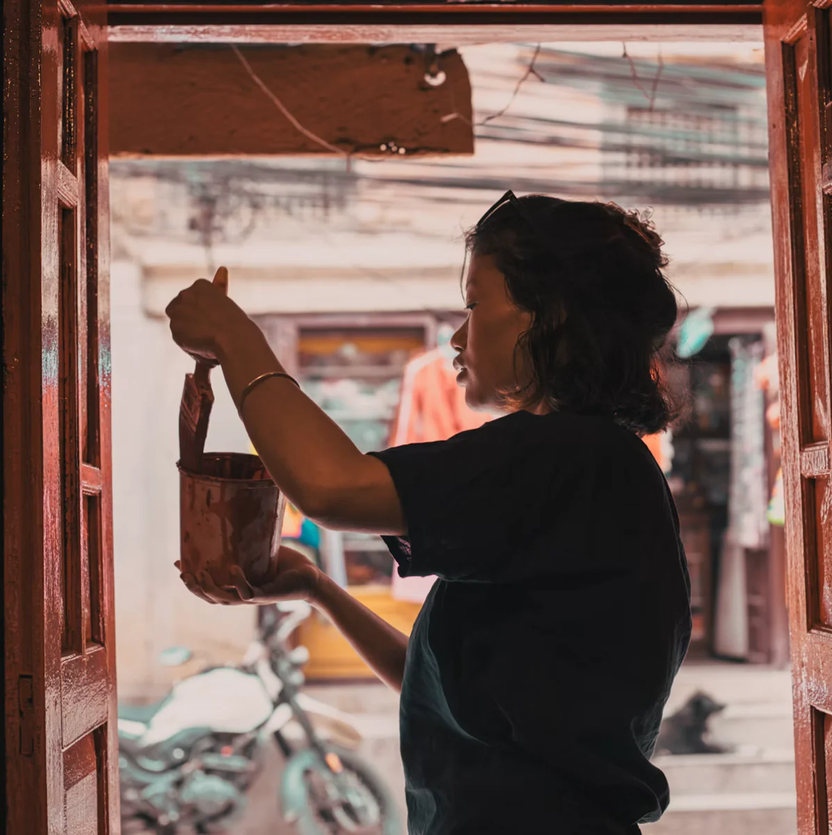 Shop owner preparing to open for customers