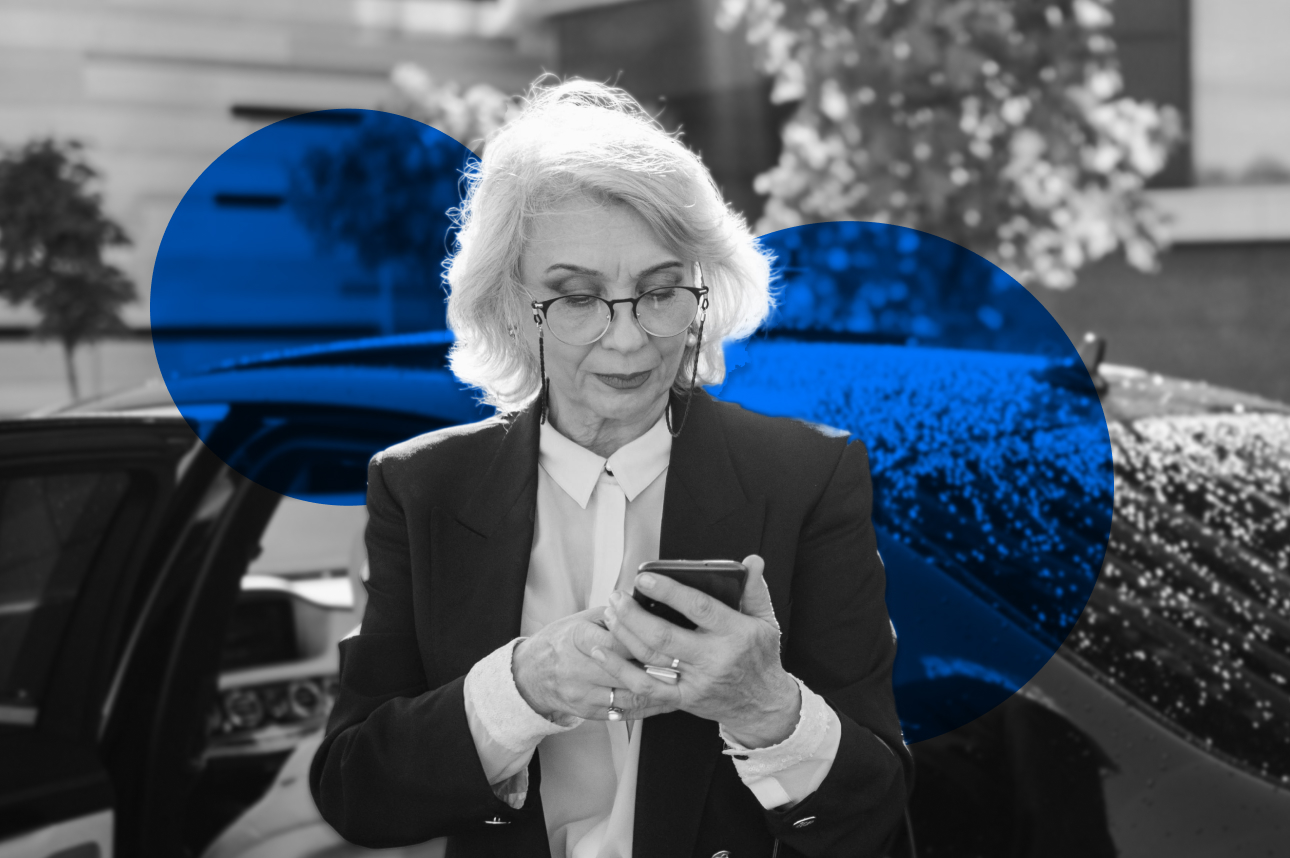 Senior professional in business attire using smartphone with blue graphic elements