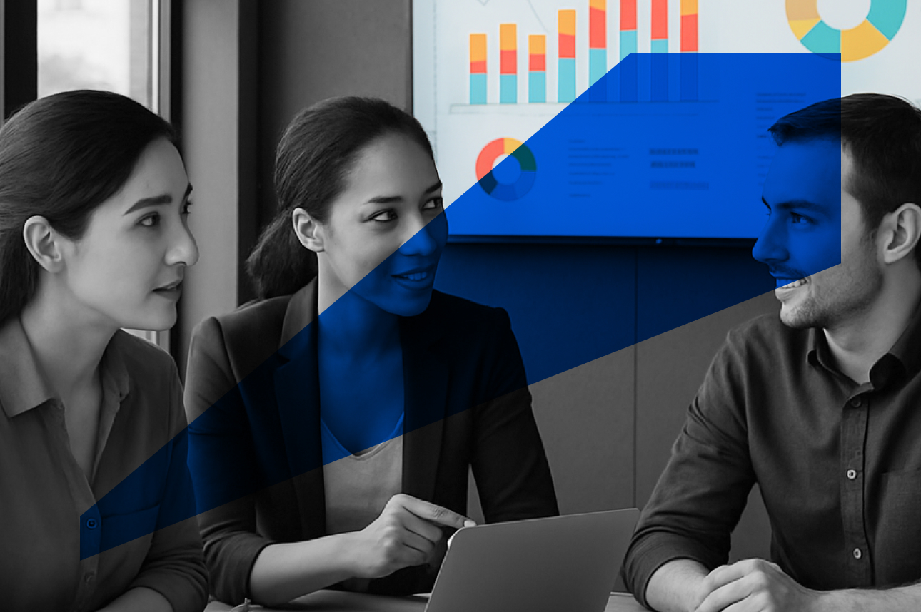 Business team analyzing colorful charts during collaborative meeting