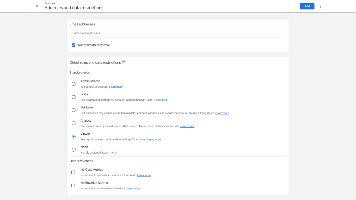 Google Analytics 4 add roles and data restrictions screen showing user permission options