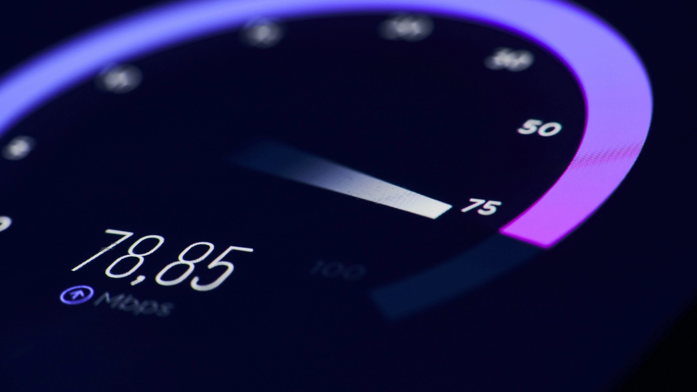 Digital speedometer dial representing fast website page load speed and high performance