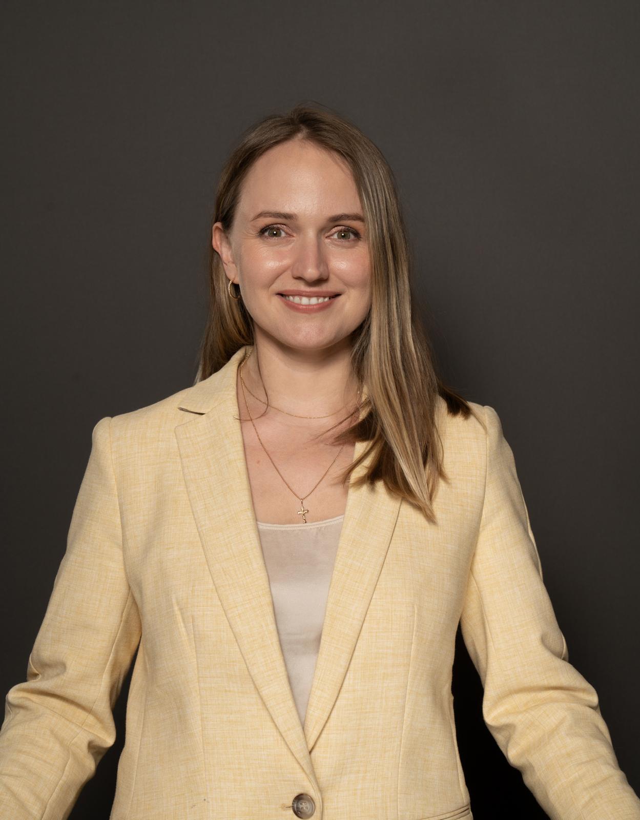 Alina Rakhuba, MD, MSc — internal medicine physician and co-leader of a real estate investment business.