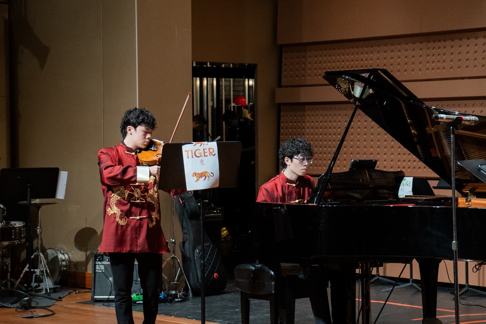 Performance of Zhi and his brother performing Violin and Piano duet