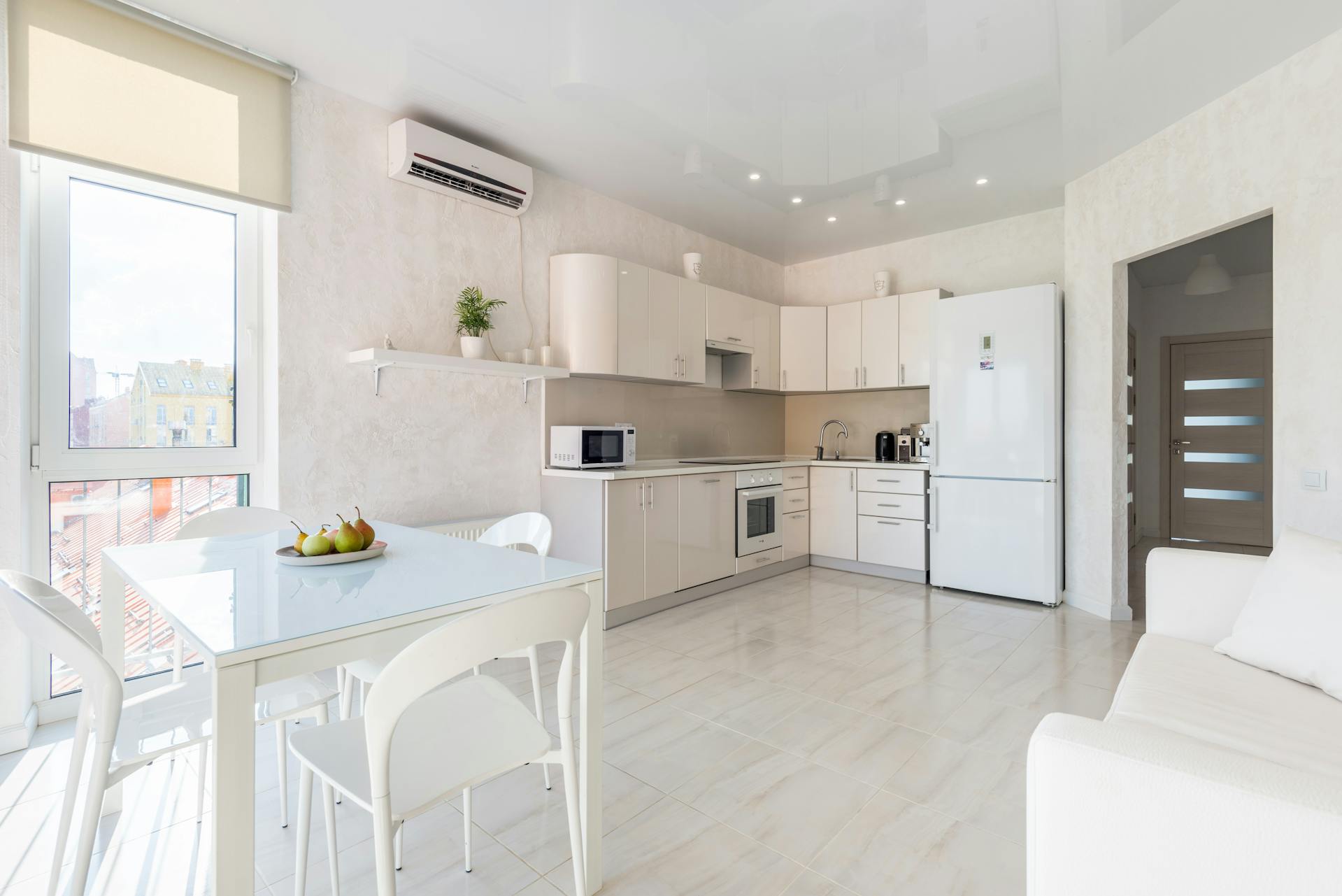 Motorized shades integrated into a kitchen