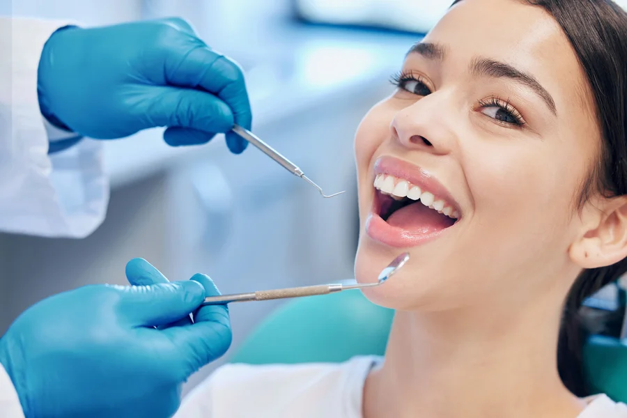 best-dentists-allentown-pa-smiling-patient-during-teeth-cleaning
