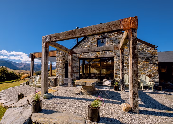 Outdoor hardwood Pergola in Queenstown using recycled beams and posts from old wharfs and brides, supplied by renovo timbers.