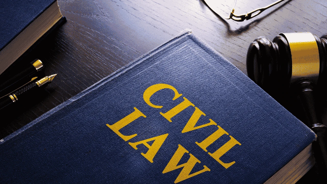 Courtroom gavel and legal documents representing Michigan non-compete enforceability Courtroom gavel and legal documents representing Michigan non-compete enforceability