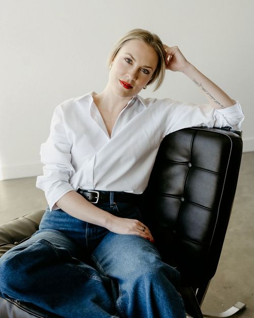 Picture of Robyn James sitting in a chair.