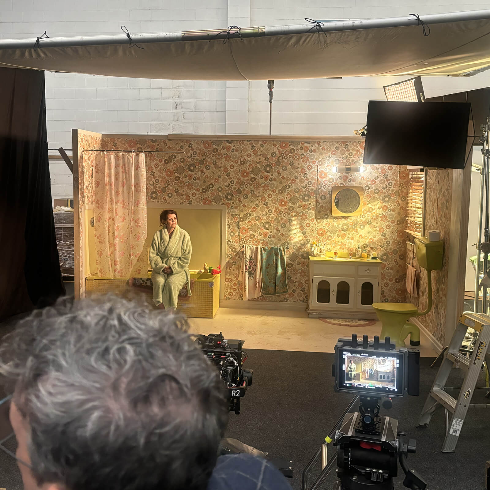 Behind-the-scenes photo from the Plugly shoot.