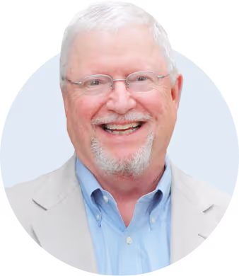 Headshot of smartly dressed man smiling
