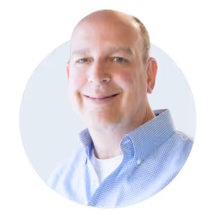 Headshot of smartly dressed man smiling