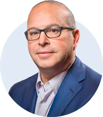 Headshot of smartly dressed man smiling