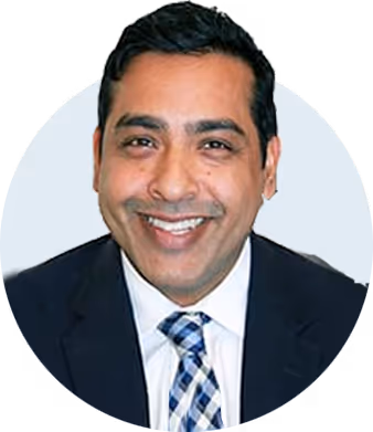 Headshot of smartly dressed man smiling