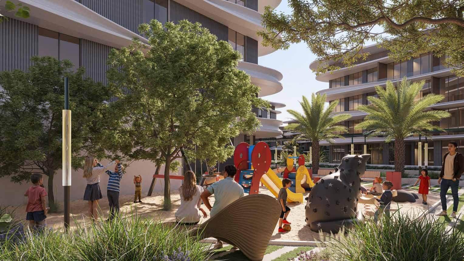 Nursery children playing in Dubailand community outdoor area