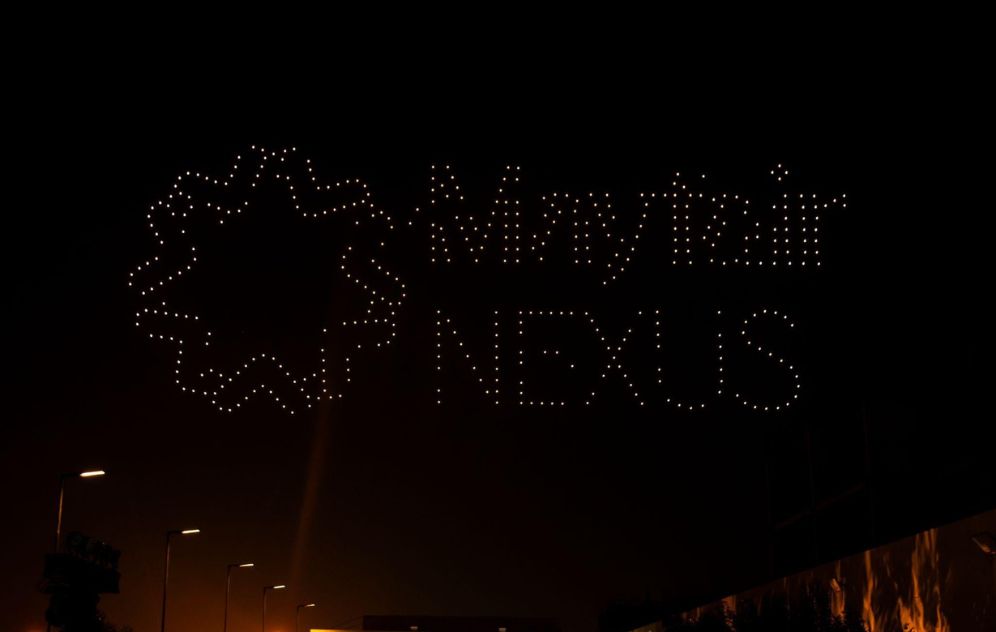 Drone show illuminating night sky at Mayfair Nexus Dubai launch event