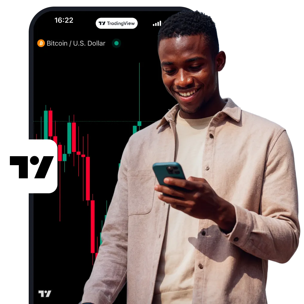 Man trading on smartphone with MT5 platform interface showing Wall Street 30 stock chart in background
