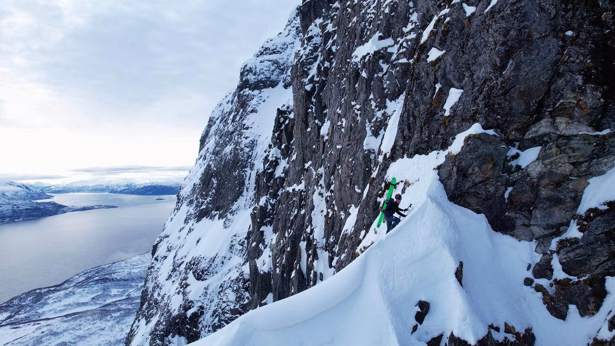 Kahuna team member climbing a mountain