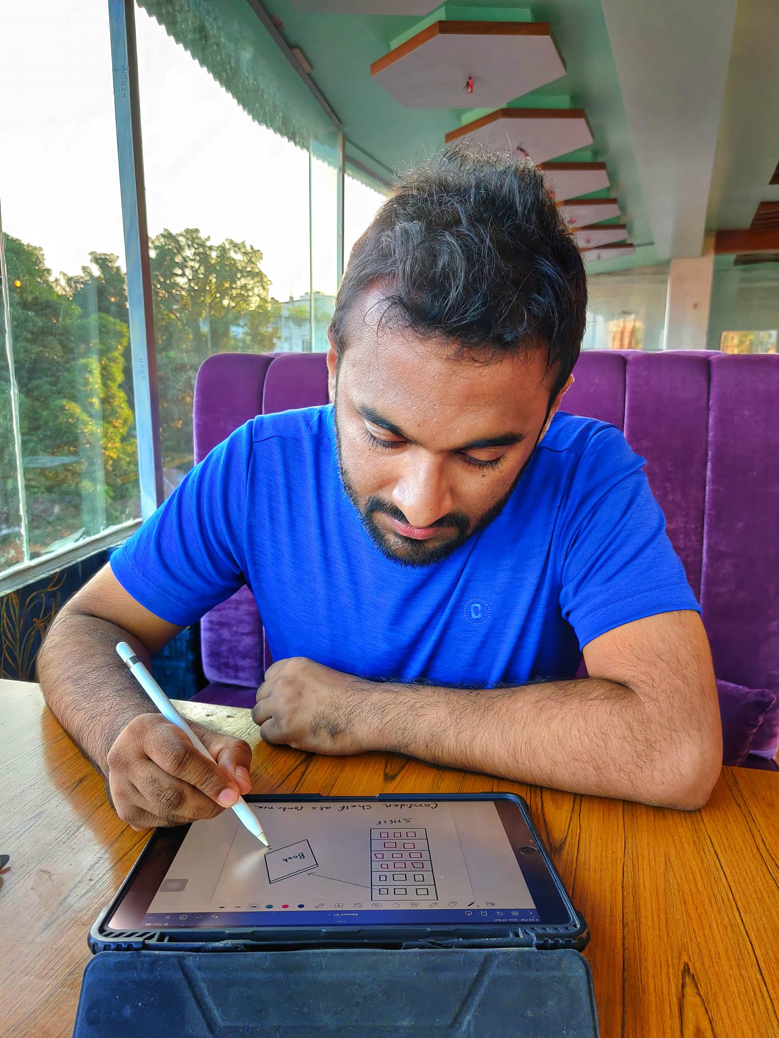 close-up of hands typing on a laptop's keyboard