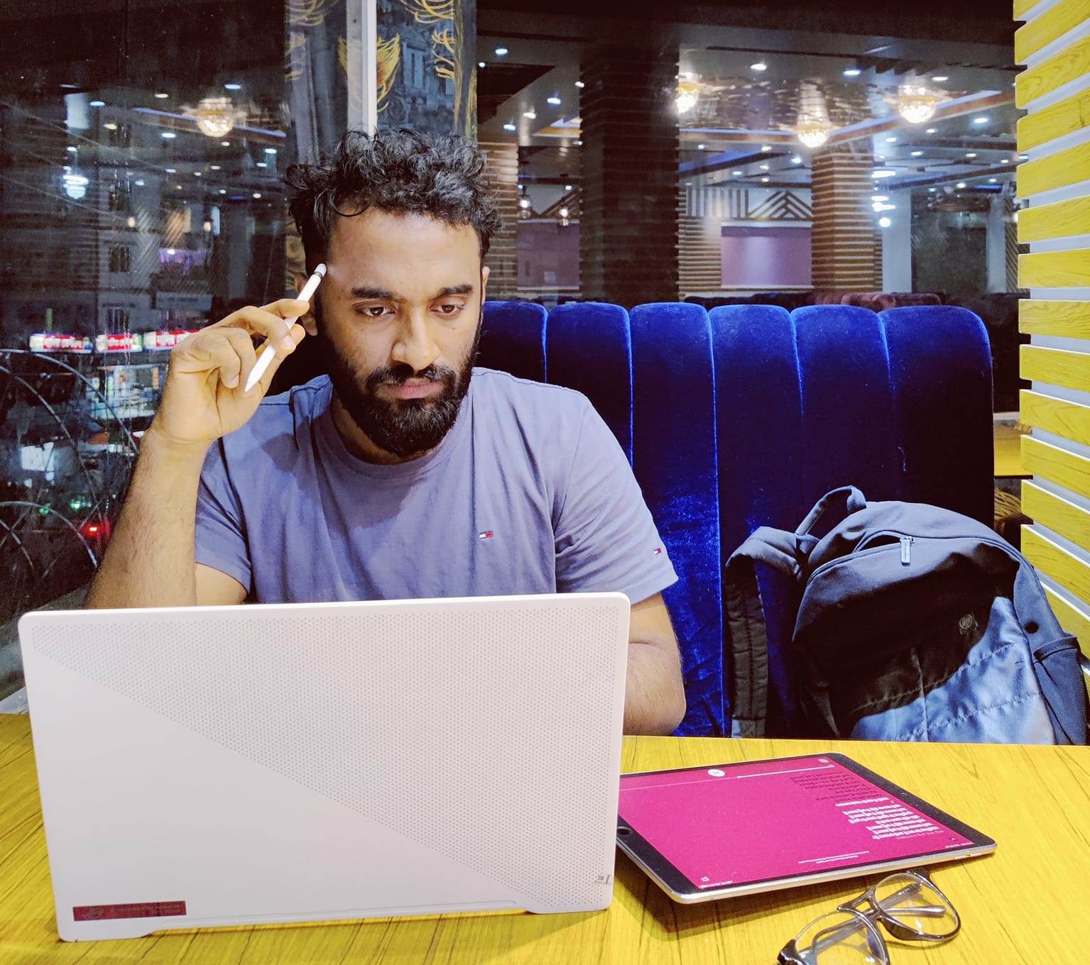 Notebook and laptop on a desk