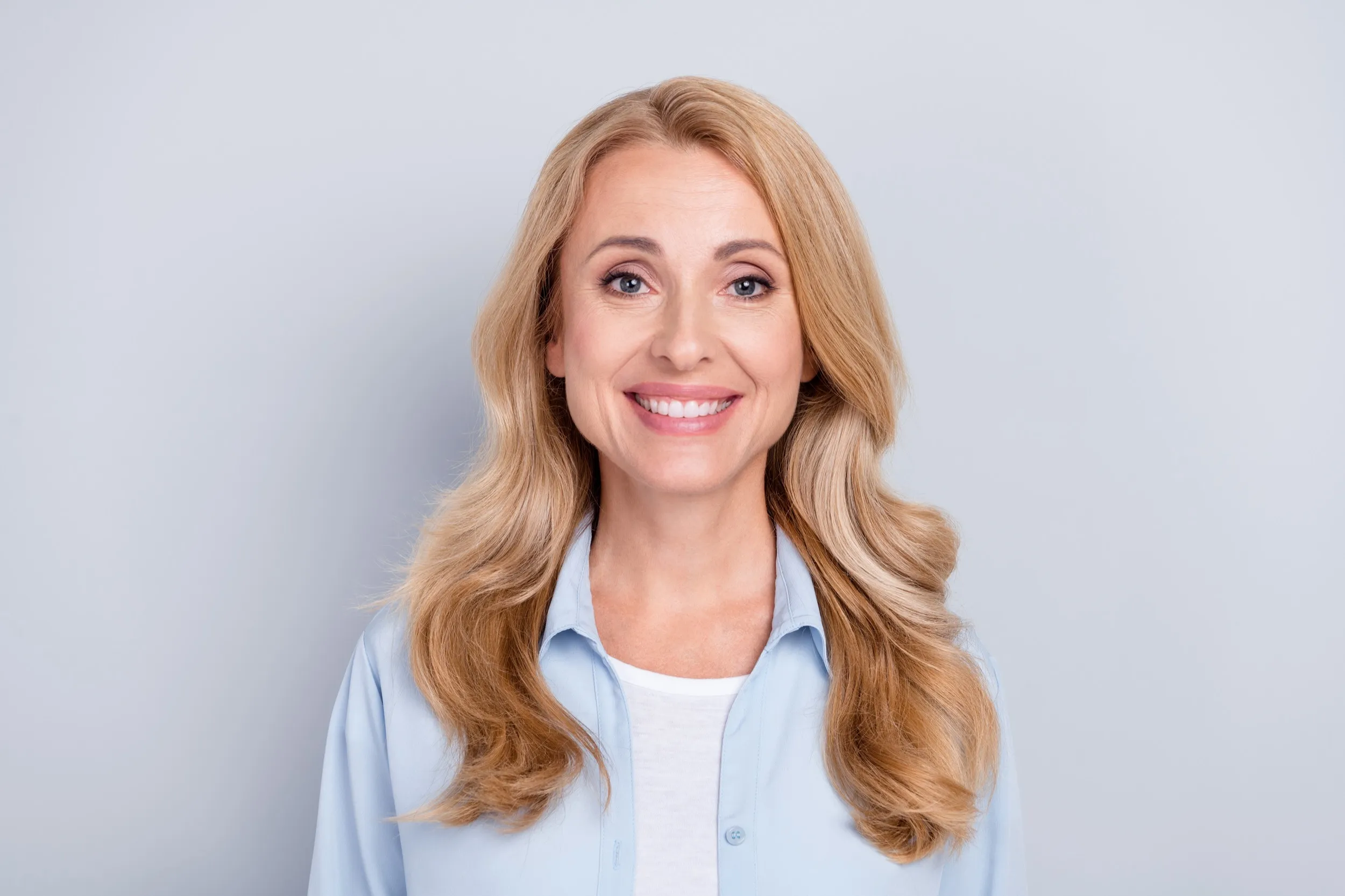 Women smiling on white background