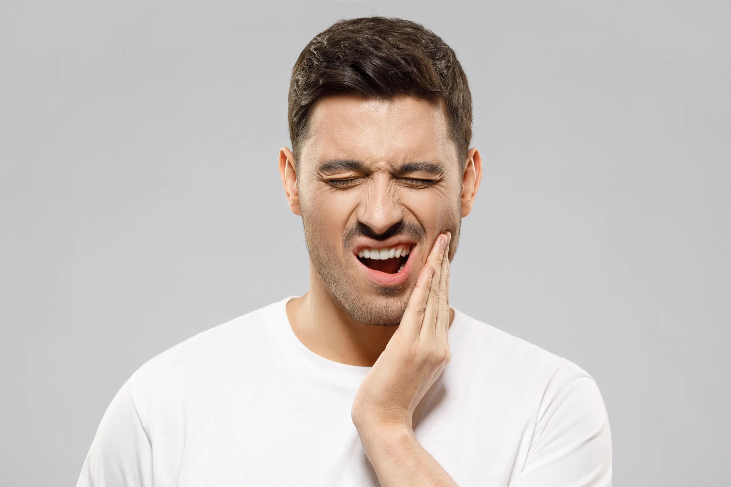 Person in pain with tooth