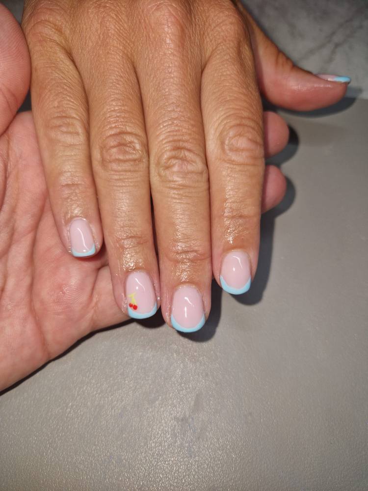 French tip manicure with pastel design Belfast – nail art at Hair by Jade salon.