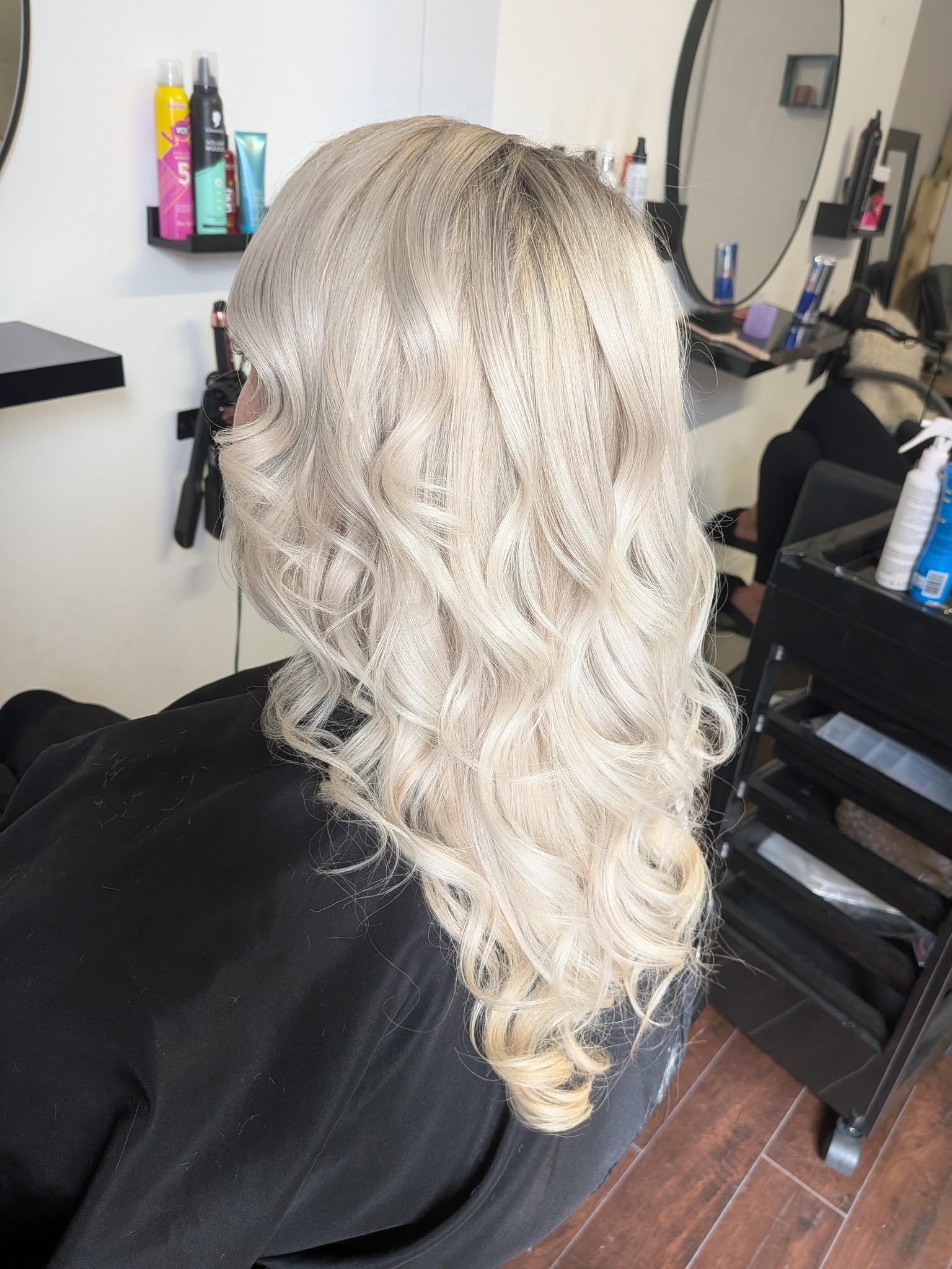 Platinum blonde curly blow dry Belfast – soft curls styling at Hair by Jade.