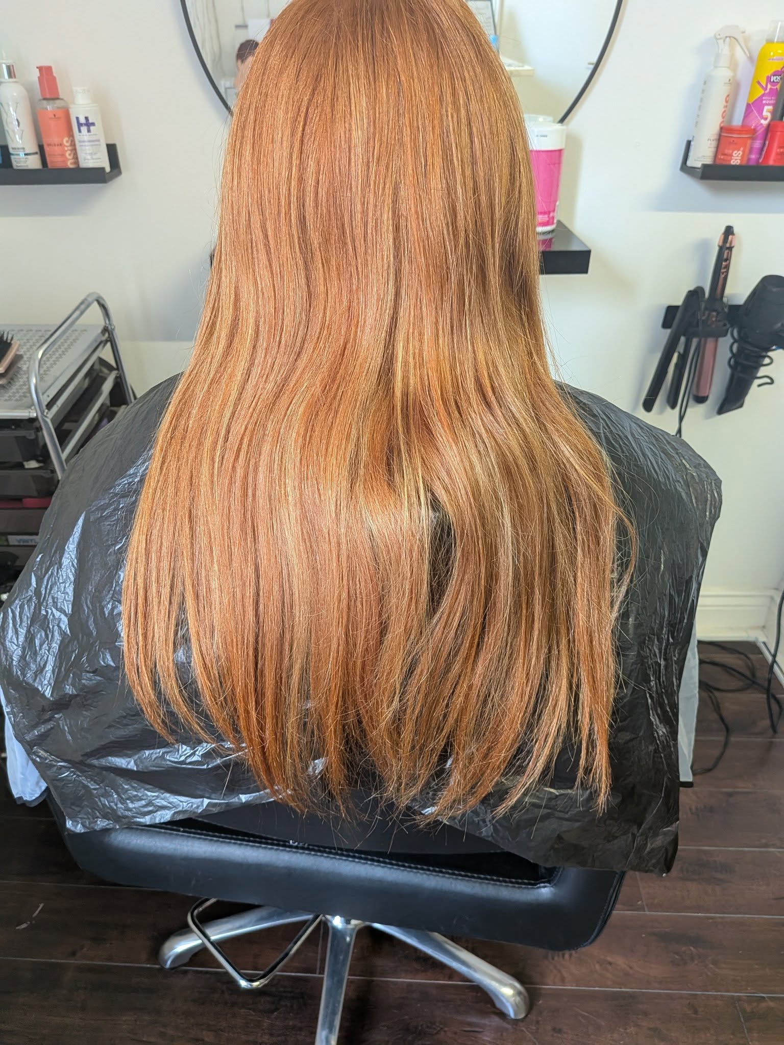 Fresh copper red straight hair colour and trim by Hair by Jade Belfast.