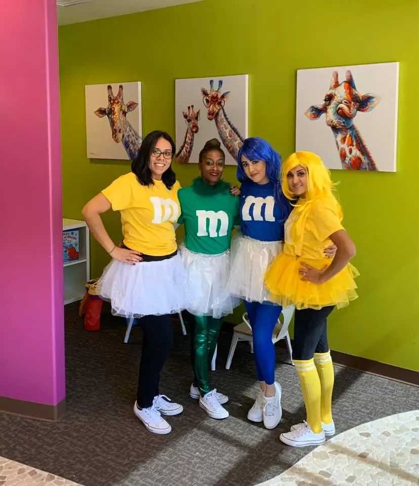 image of a teacher interacting with students using digital tools